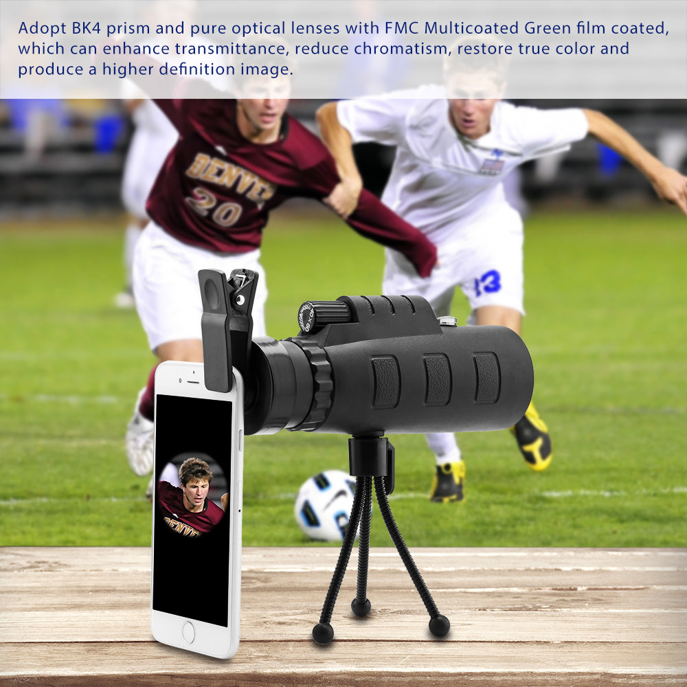 Telescope mounted on a stand with smart phone attached to the phone clip for watching sports games, photography